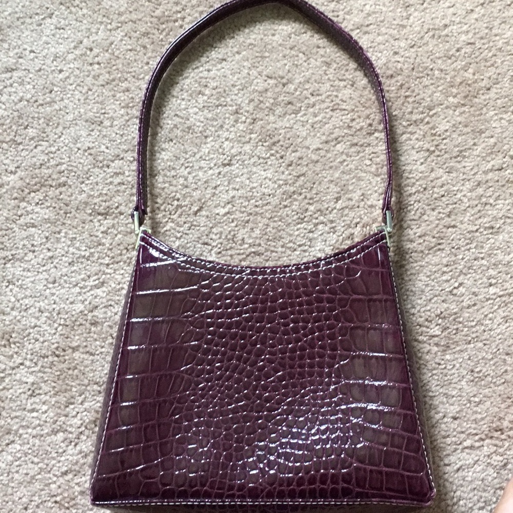 Liz Claiborne plum colored shoulder bag.